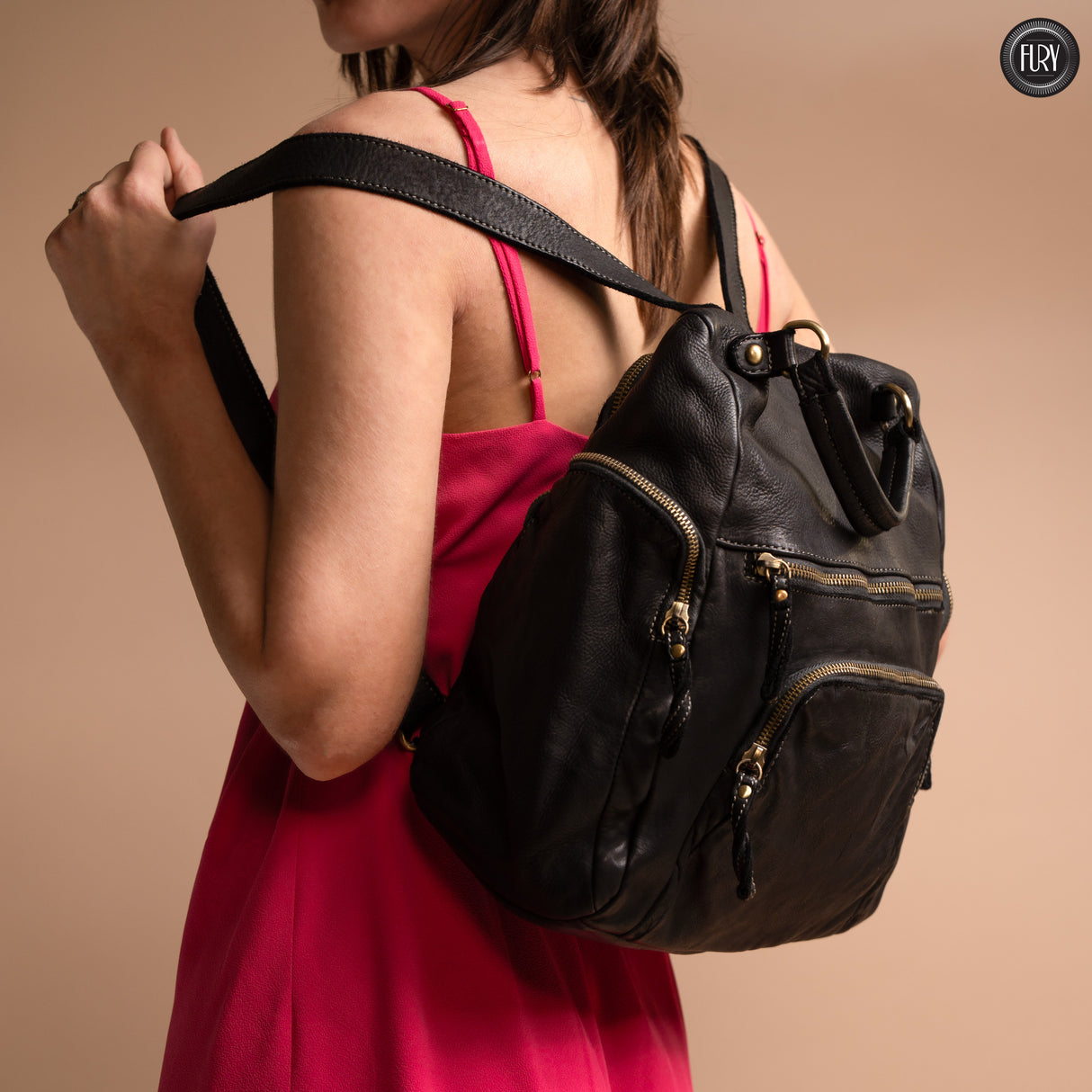 Multi-pocket leather backpack