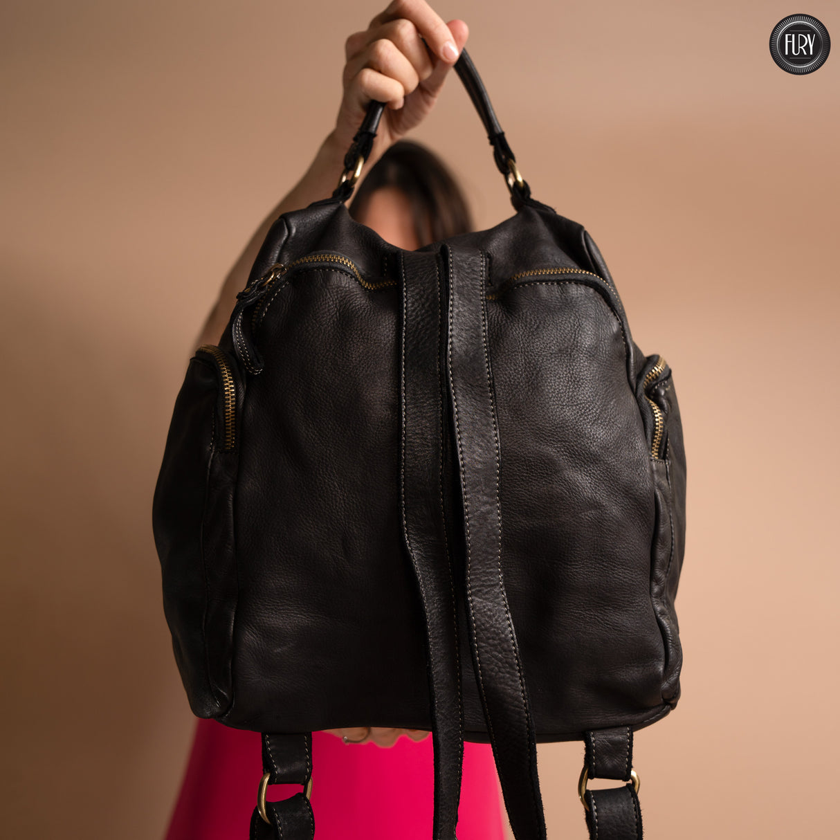 Multi-pocket leather backpack