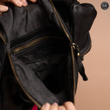 Multi-pocket leather backpack