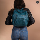 Multi-pocket leather backpack