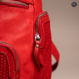 Multi-pocket backpack in woven leather