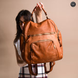 Multi-pocket leather backpack