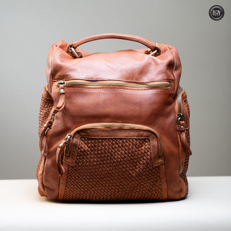 Multi-pocket backpack in woven leather