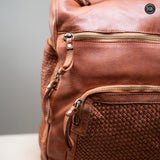 Multi-pocket backpack in woven leather