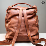 Multi-pocket backpack in woven leather