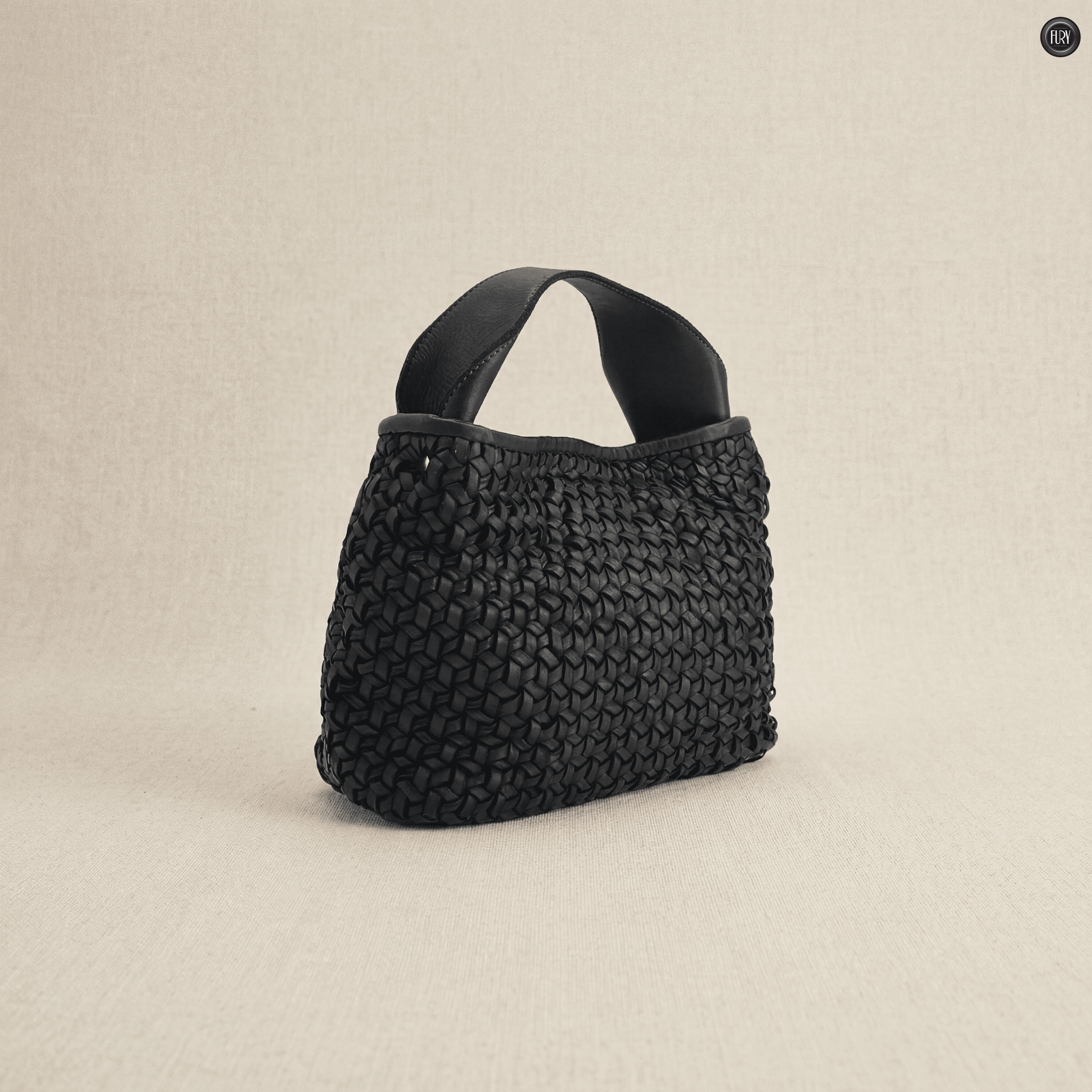 Borsetta Tea in pelle intrecciata