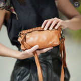 Pochette small in pelle intrecciata Fury Bags#colore_cuoio